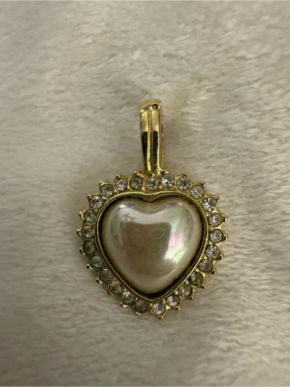 Vintage gold tone heart shaped pendant by the Roman jewelry company